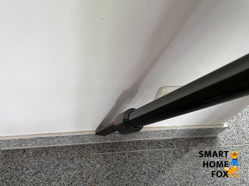 Crevice nozzle cleaning skirting boards.